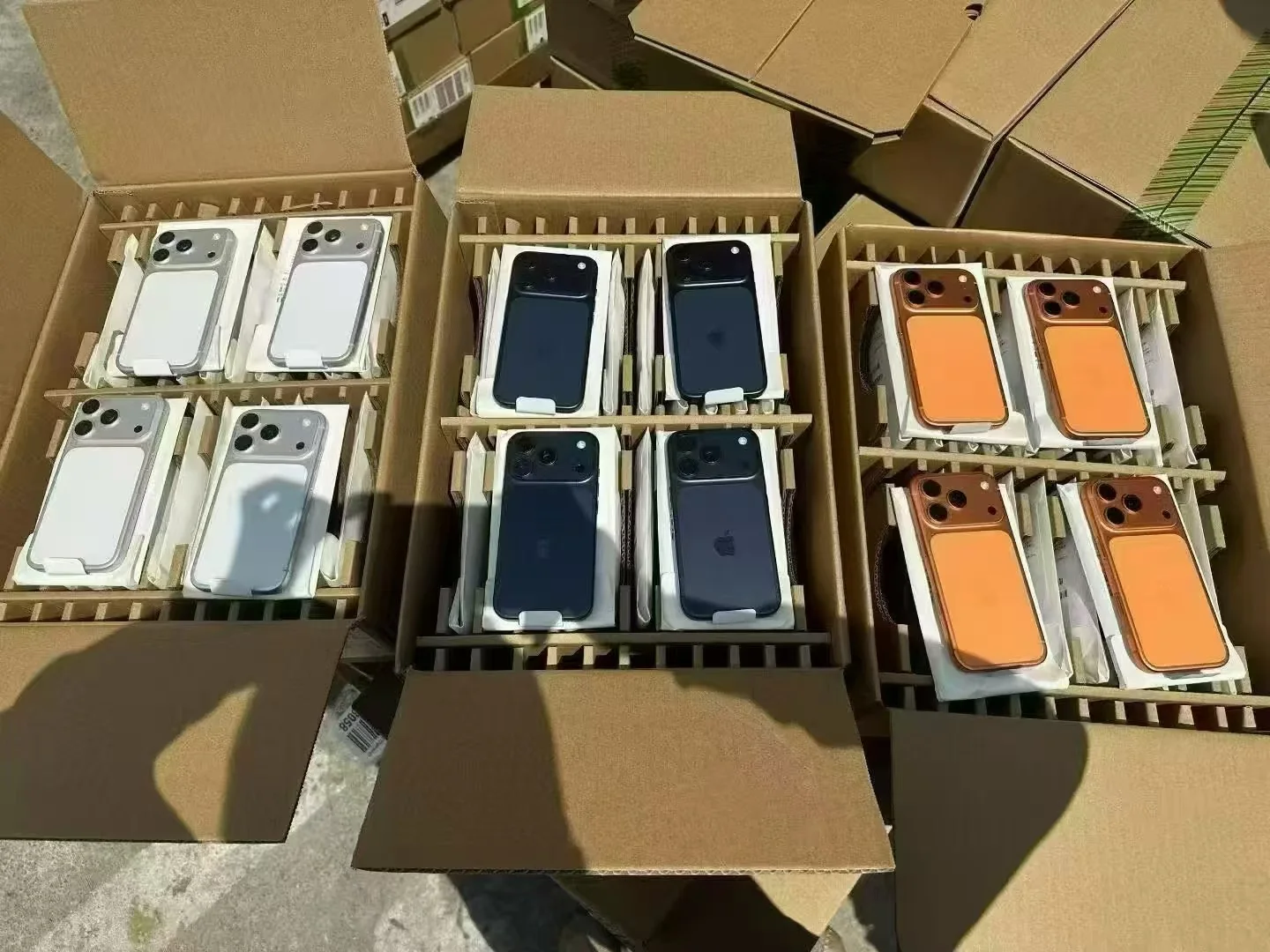 Newer iPhone style devices packed for bulk handling